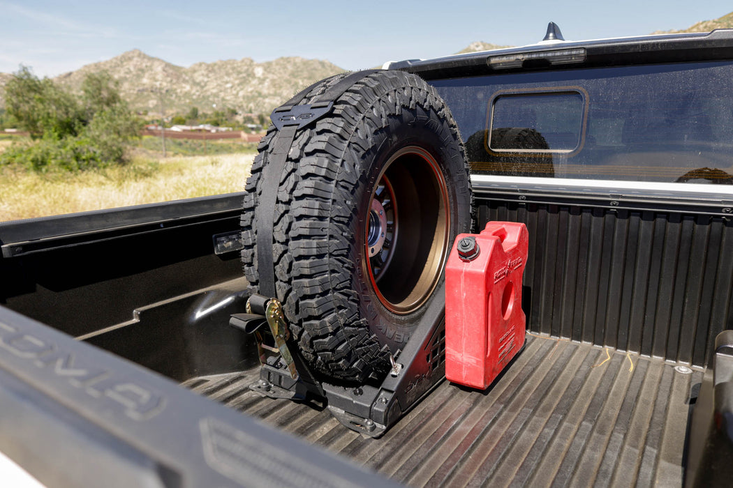 Off road with the Universal Truck Bed Tire Carrier & Accessory Mount